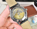 Wristwatch caseback with mechanical movement and text, black leather strap
