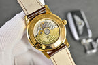 Vacheron Constantin watch with gold-tone caseback, labeled dial, brown leather strap