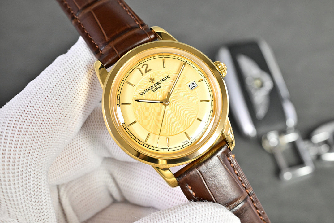 Vacheron Constantin watch with gold-tone round case and brown leather strap