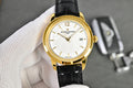 Vacheron Constantin watch with gold-tone case, white dial, black leather strap