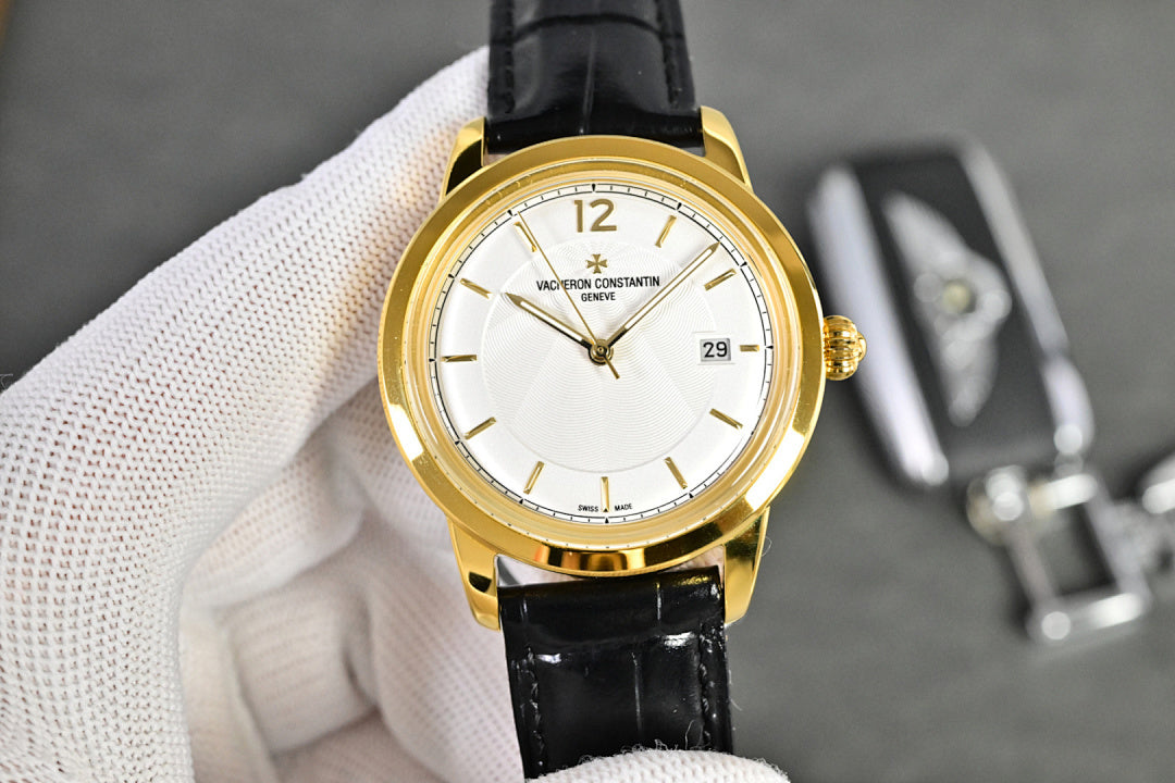 Vacheron Constantin watch with gold-tone case, white dial, black leather strap