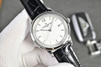 Vacheron Constantin watch with silver-tone case, white dial, black leather strap