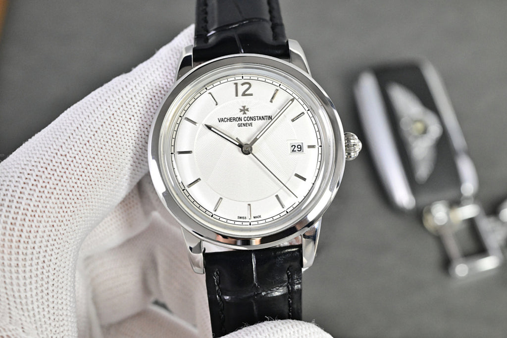 Vacheron Constantin watch with white dial, black leather strap, date window at 29