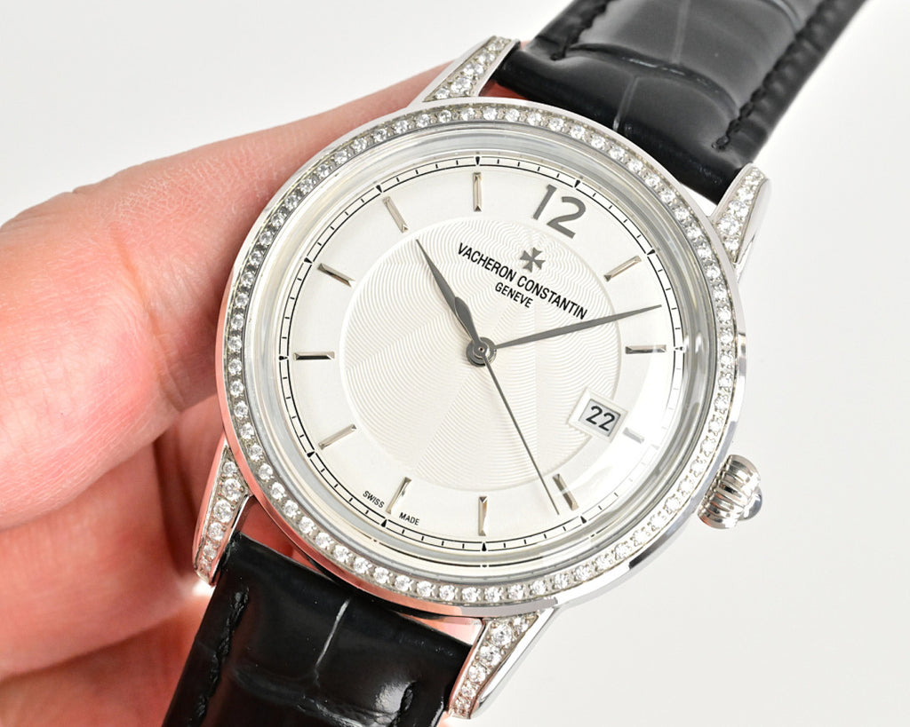 Vacheron Constantin watch with white dial, diamond bezel, black leather strap, round crown