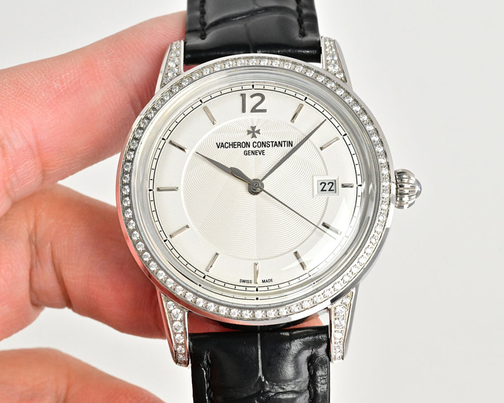 Vacheron Constantin watch with white dial and diamond-studded bezel on black leather strap