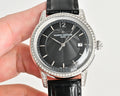 Vacheron Constantin watch with black dial, diamond bezel, black leather strap, round crown