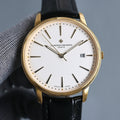 Vacheron Constantin wristwatch: white dial, black leather strap, gold case, date at 8.