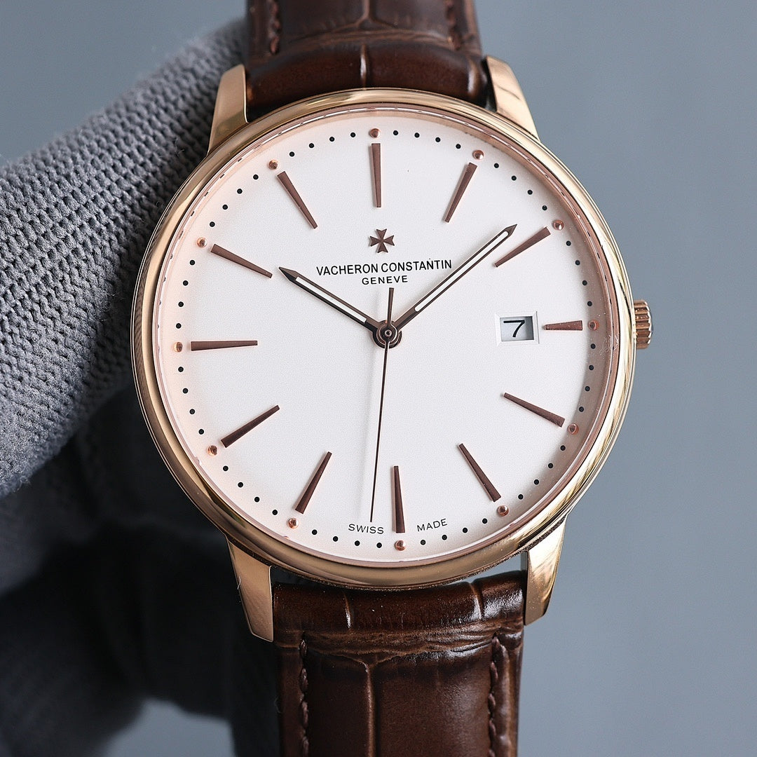 Vacheron Constantin wristwatch: white dial, brown leather strap, gold case, date at 7.