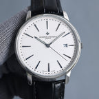 Vacheron Constantin wristwatch front: white dial, black leather strap, silver case, date at 7.