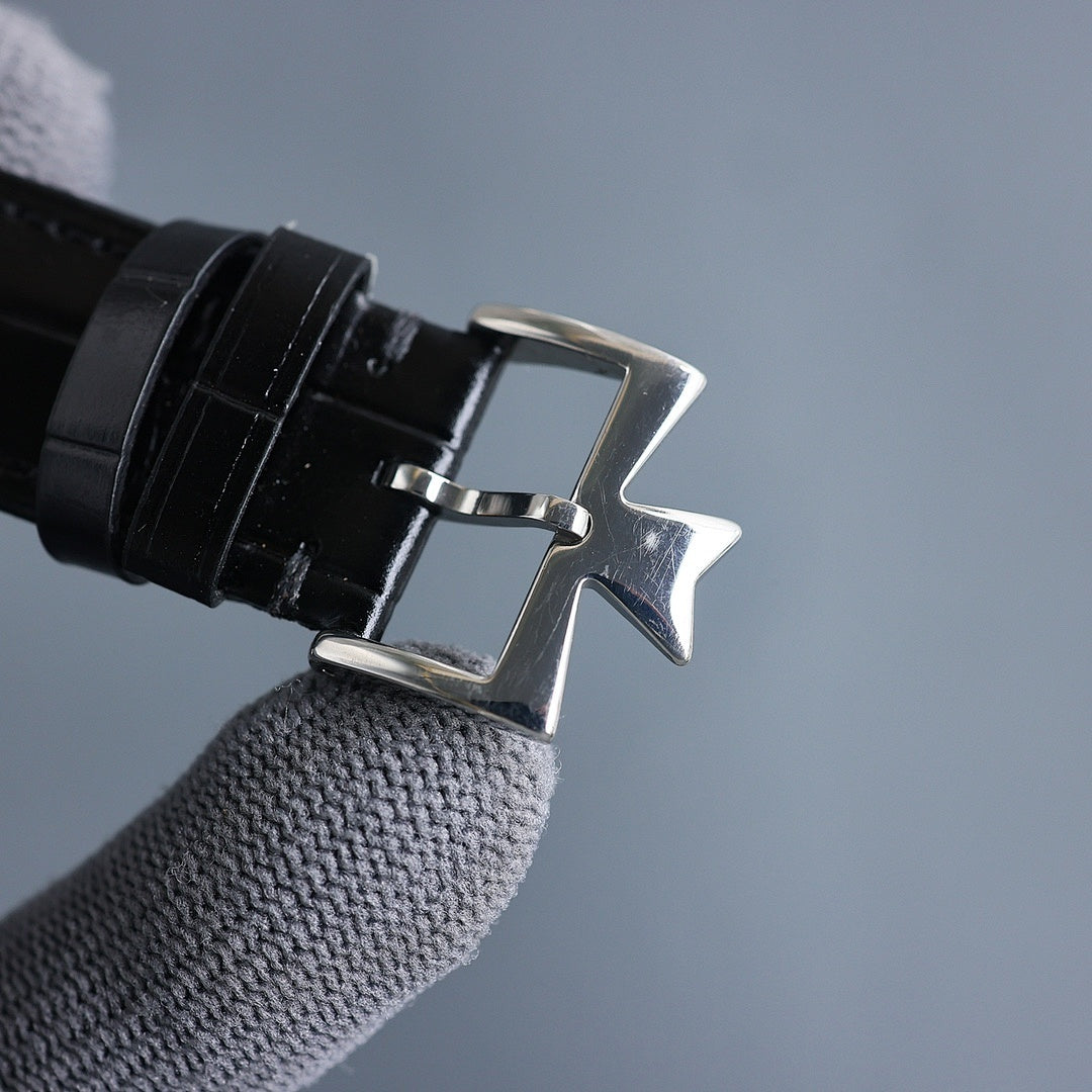 Vacheron Constantin wristwatch clasp with black leather strap and silver buckle.