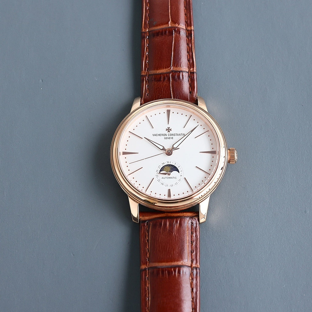 Vacheron Constantin automatic watch with white dial, moonphase, and brown leather strap