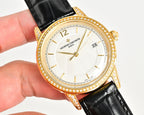 Gold-tone wristwatch with diamond bezel, black leather strap, white dial