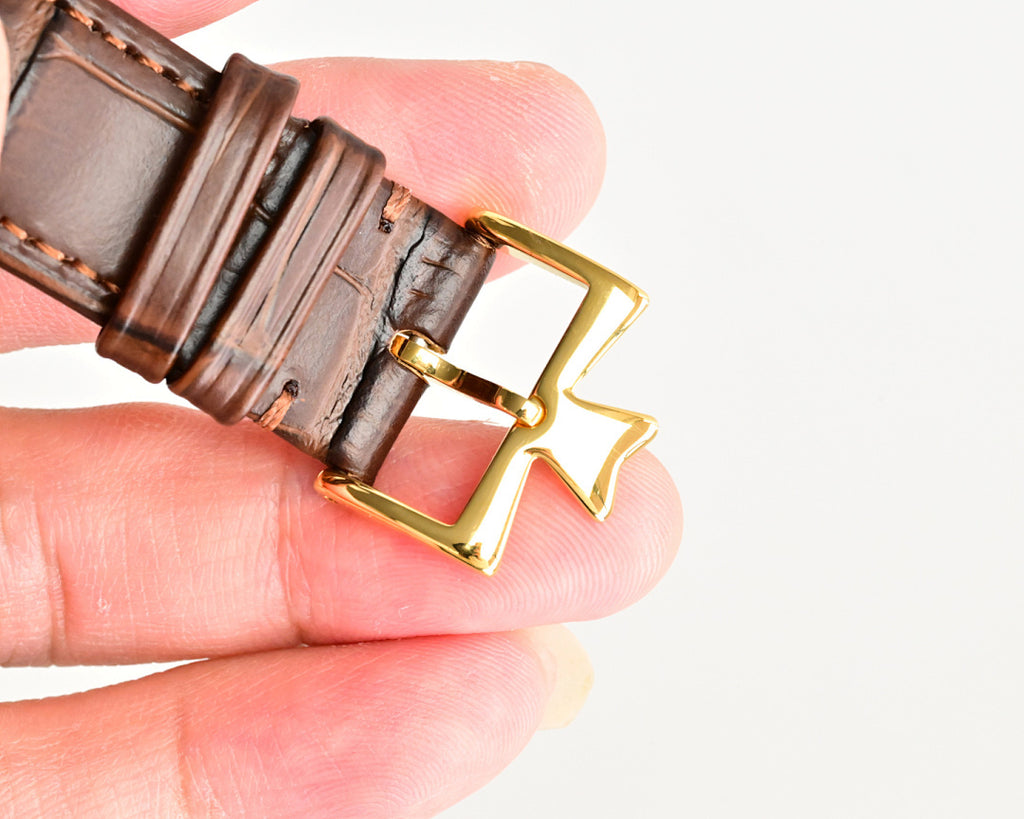 Brown leather watch strap with gold clasp and buckle