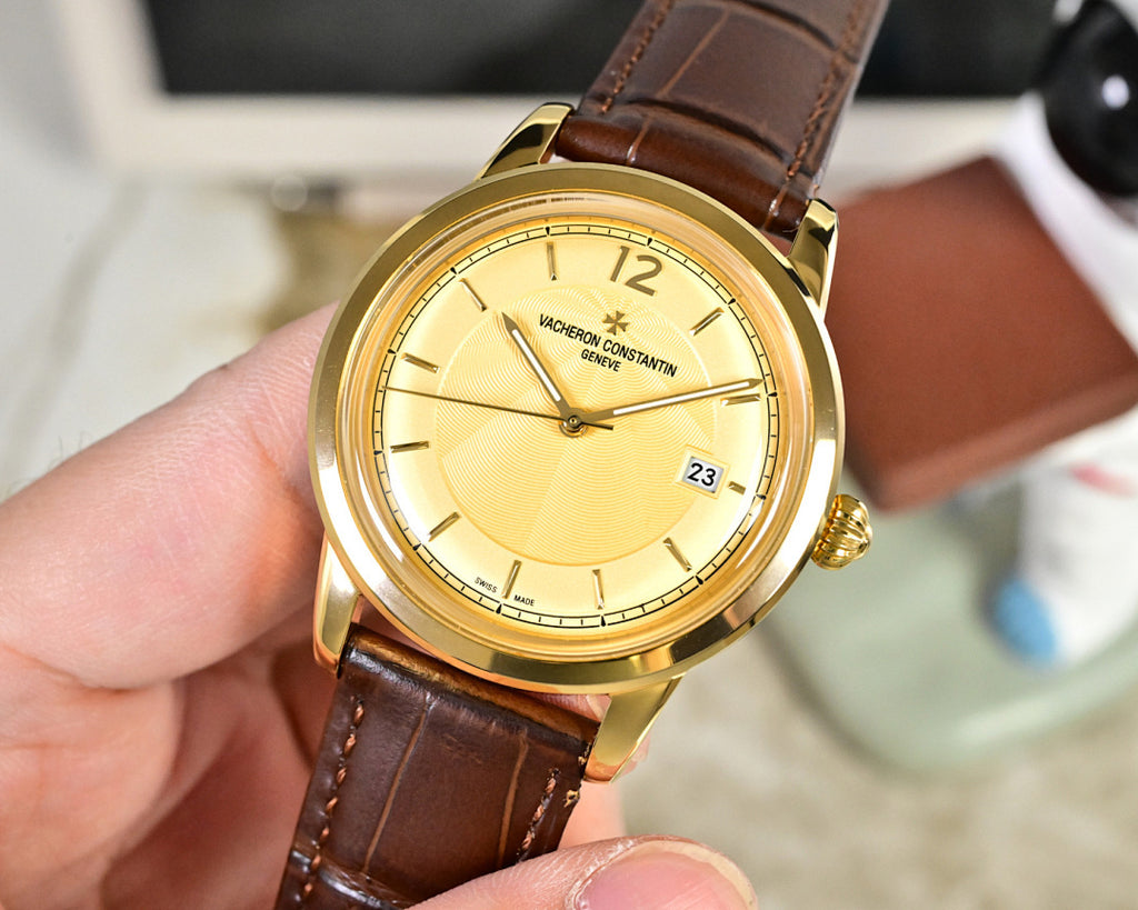 Gold-tone wristwatch with yellow dial and brown leather strap, front view