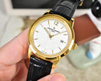 Gold-tone wristwatch with white dial and black leather strap, front view