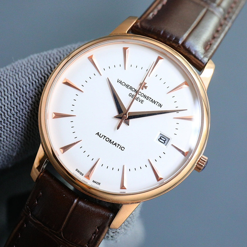 Vacheron Constantin wristwatch with white dial, gold case, brown leather strap, date window