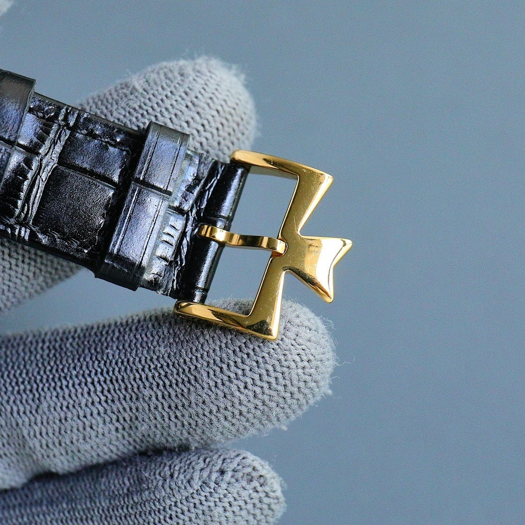 Vacheron Constantin watch clasp with black leather strap and gold buckle