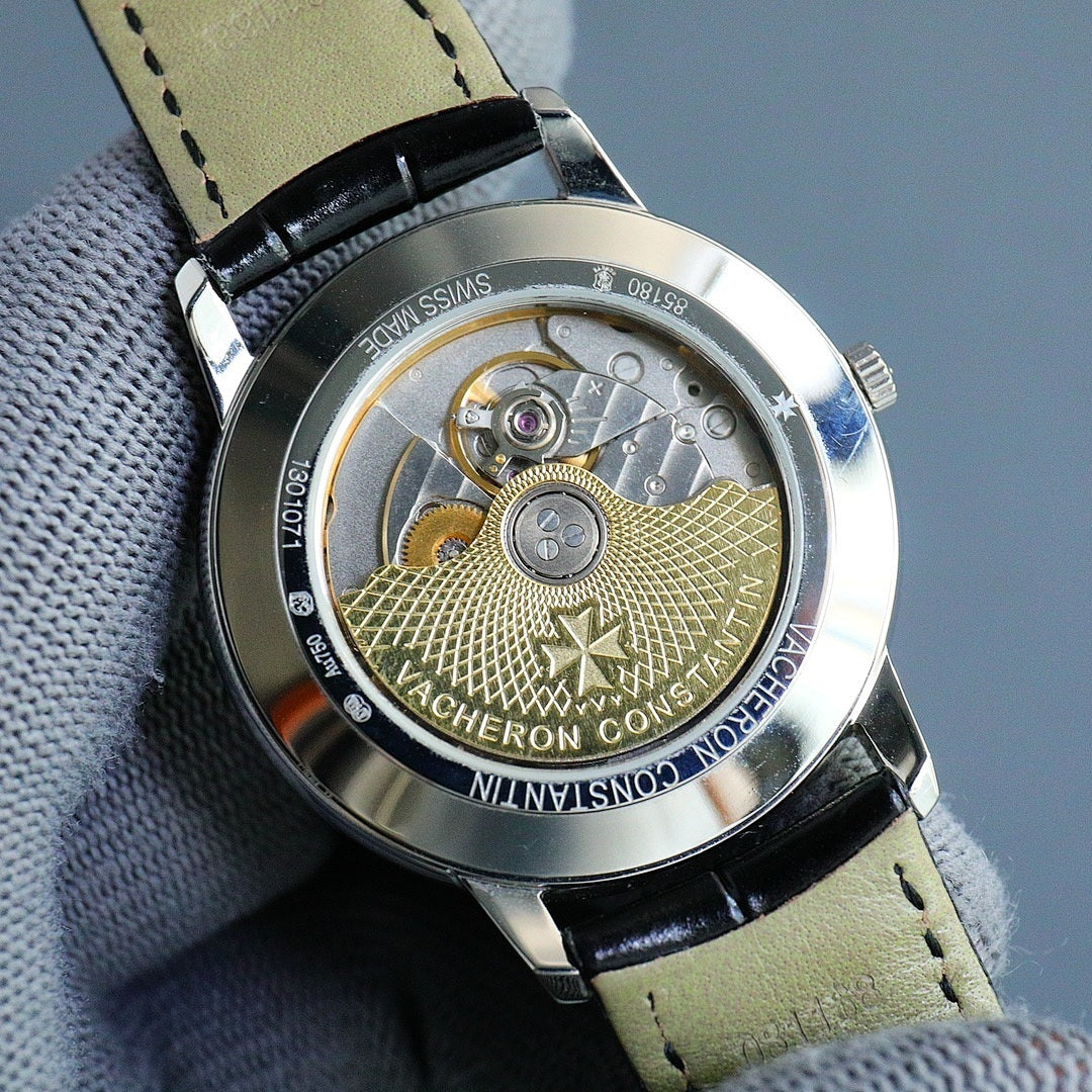 Skeleton caseback with detailed movement and gold-toned parts on leather strap