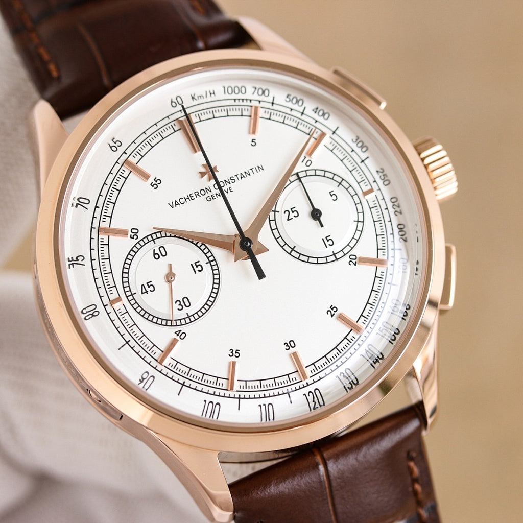 Vacheron Constantin watch with white dial, black subdials, brown leather strap, rose gold case