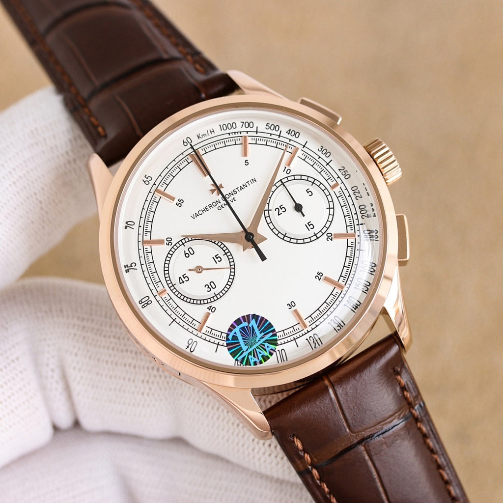 Vacheron Constantin watch with white dial and teal emblem, brown leather strap, rose gold case