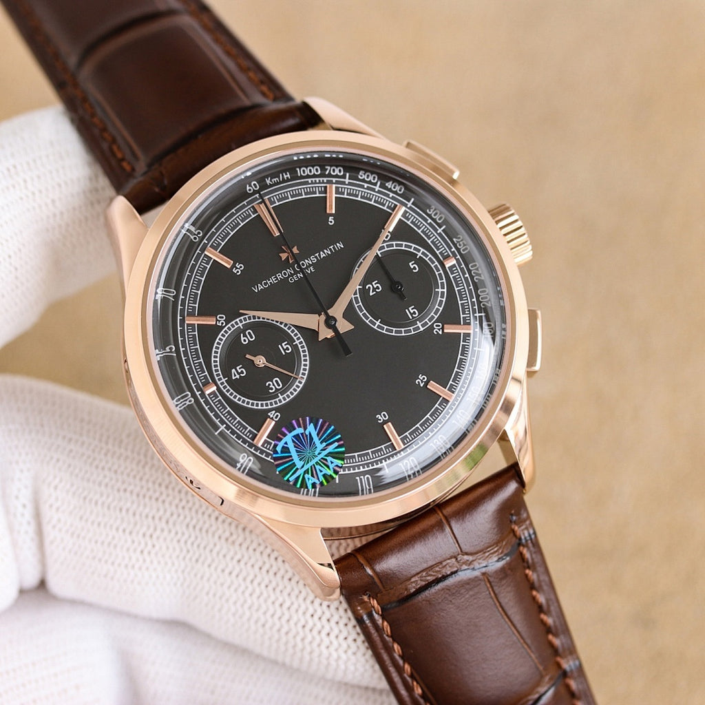 Vacheron Constantin watch with black dial, teal emblem, brown leather strap, rose gold case
