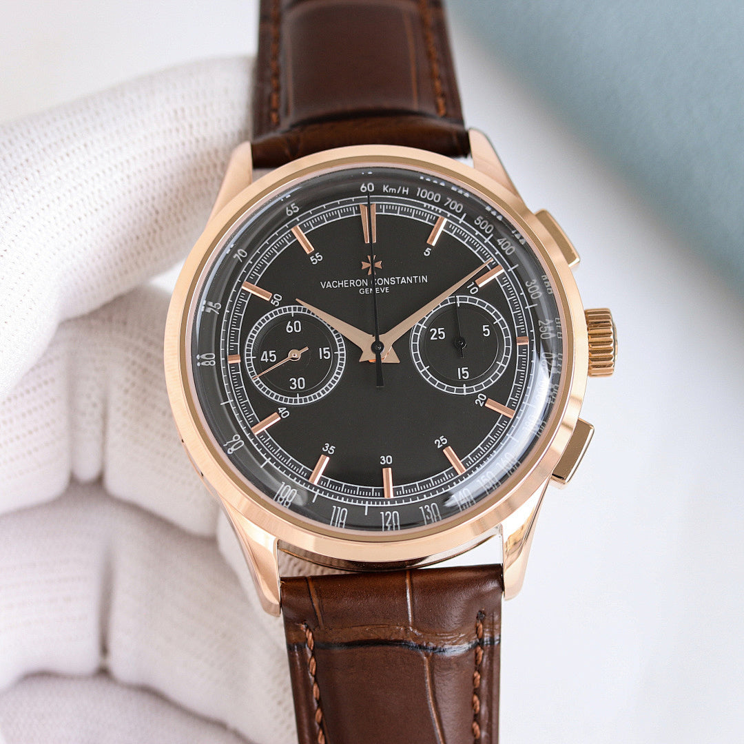 Round wristwatch with brown leather strap, rose gold case, black chronograph dial