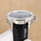 Vacheron Constantin watch, silver case with crown and pushers, black leather strap