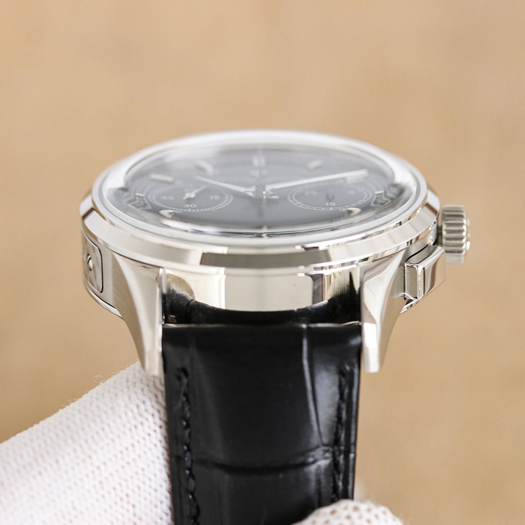 Vacheron Constantin watch, silver case with crown and pushers, black leather strap
