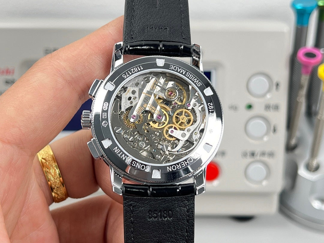 Vacheron Constantin wristwatch back view, exposed mechanical movement on black leather strap