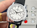 Vacheron Constantin wristwatch with white dial, black leather strap, three subdials