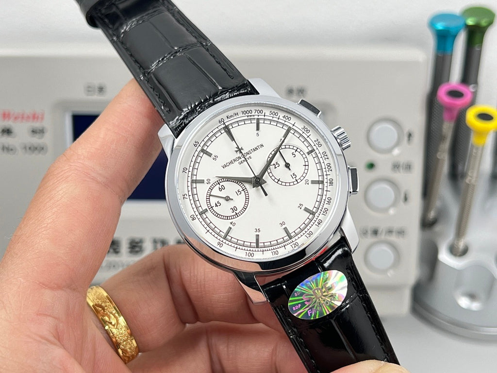 Vacheron Constantin wristwatch angled view, black leather strap, white dial with multiple hands