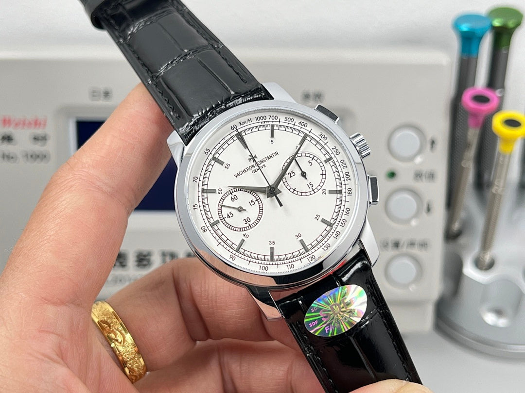 Vacheron Constantin wristwatch angled view, black leather strap, white dial with multiple hands