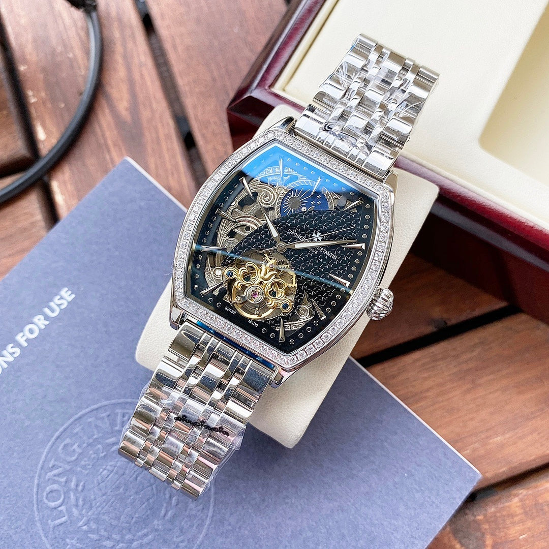 Gold-and-silver automatic wristwatch with diamond bezel and blue skeleton dial