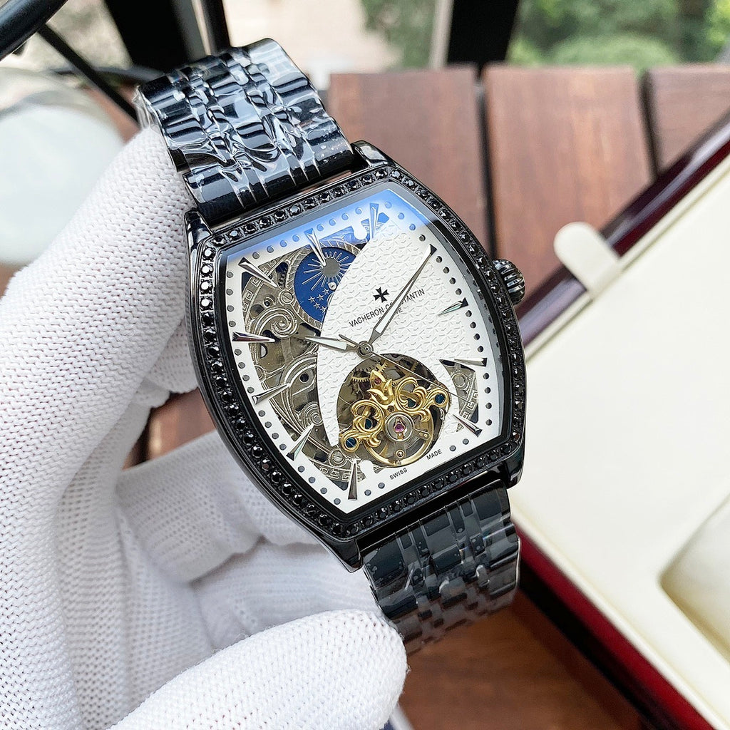 Black-toned automatic wristwatch with diamond bezel, white skeleton dial and dark bracelet