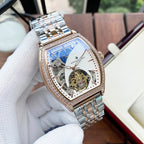 Gold-and-silver automatic wristwatch with diamond bezel and white skeleton dial