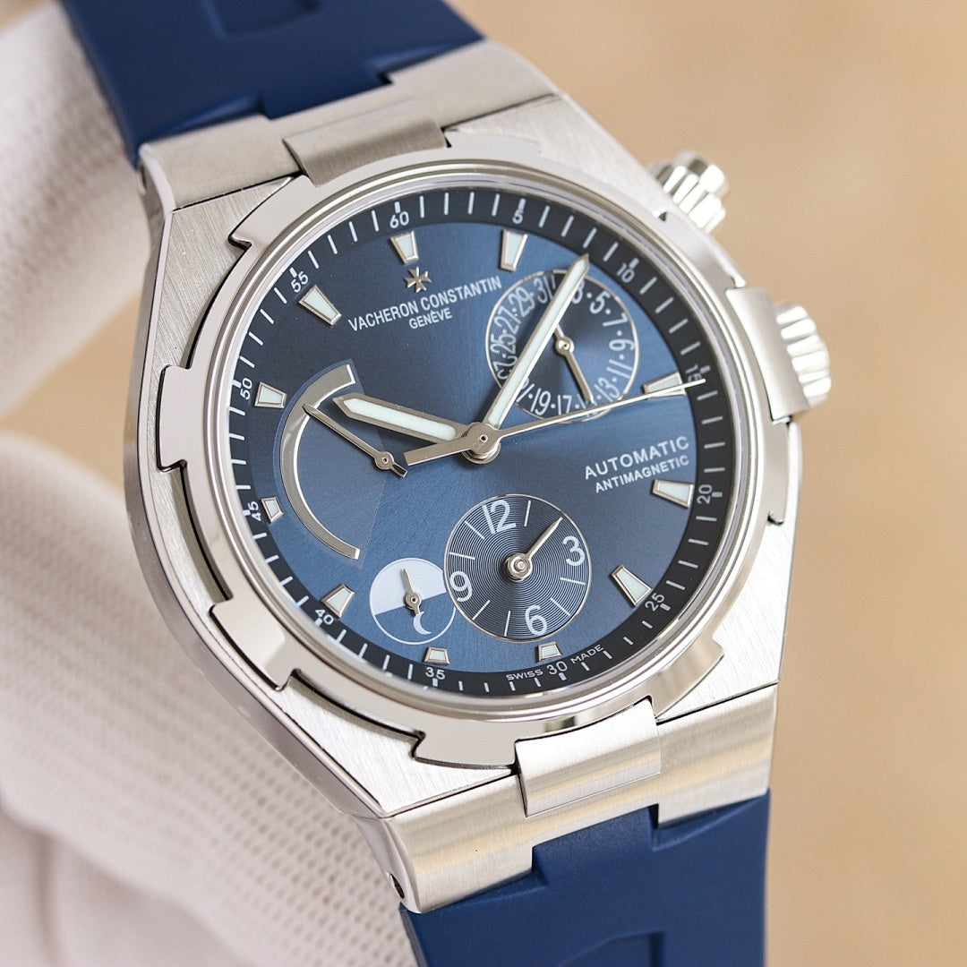Vacheron Constantin wristwatch, steel case, dark blue dial, rose-gold accents, blue rubber strap
