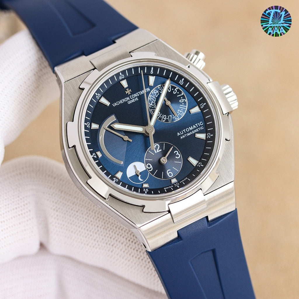 Vacheron Constantin wristwatch, steel case, dark blue dial, rose-gold hands, blue rubber strap
