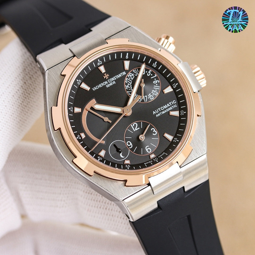 Vacheron Constantin wristwatch, steel case, dark dial with rose-gold bezel, black rubber strap