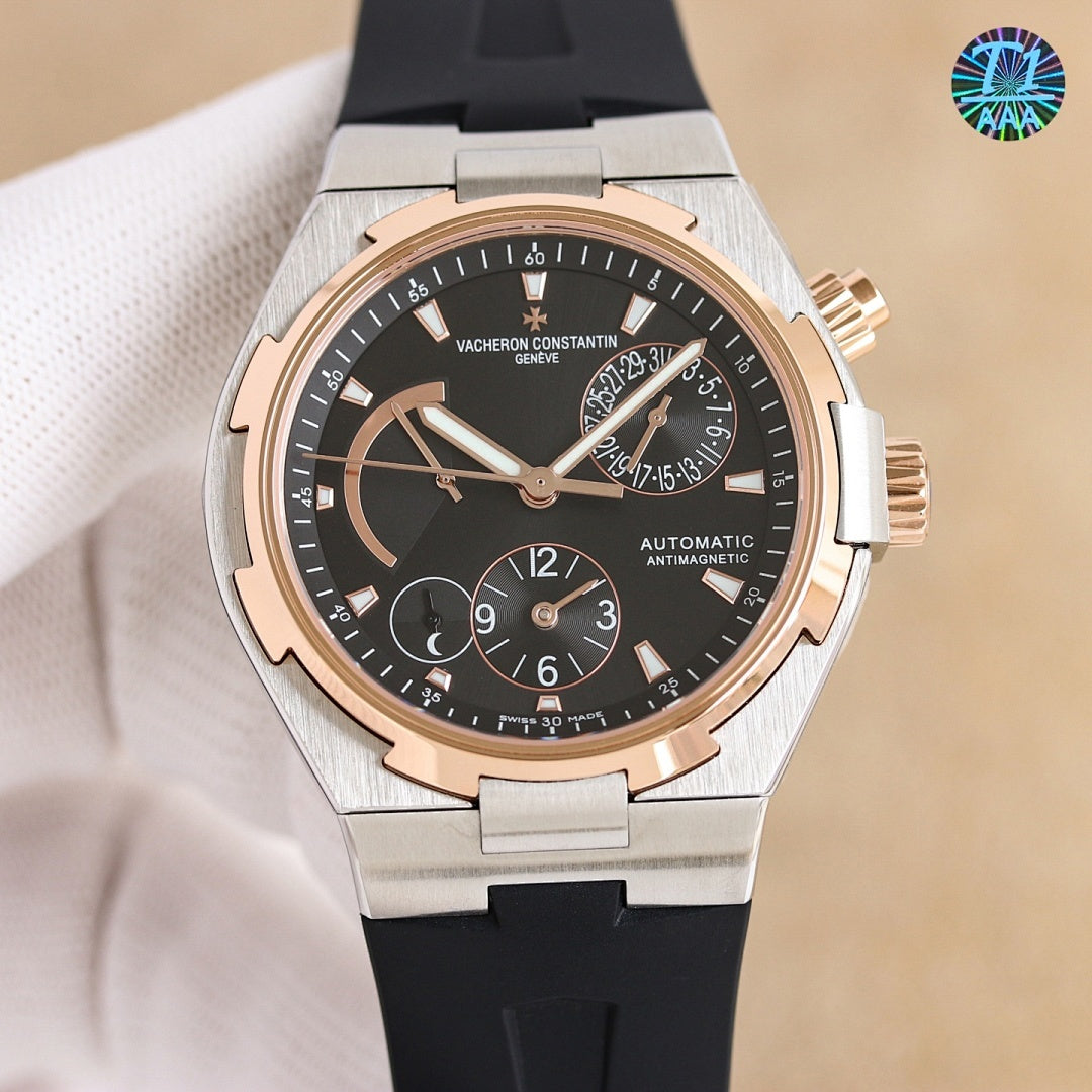 Vacheron Constantin wristwatch, steel case, dark dial, rose-gold accents, black rubber strap