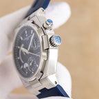 Vacheron Constantin wristwatch, steel side with crown, dark dial, blue rubber strap