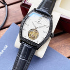 Wristwatch with white dial, jeweled bezel, black leather strap