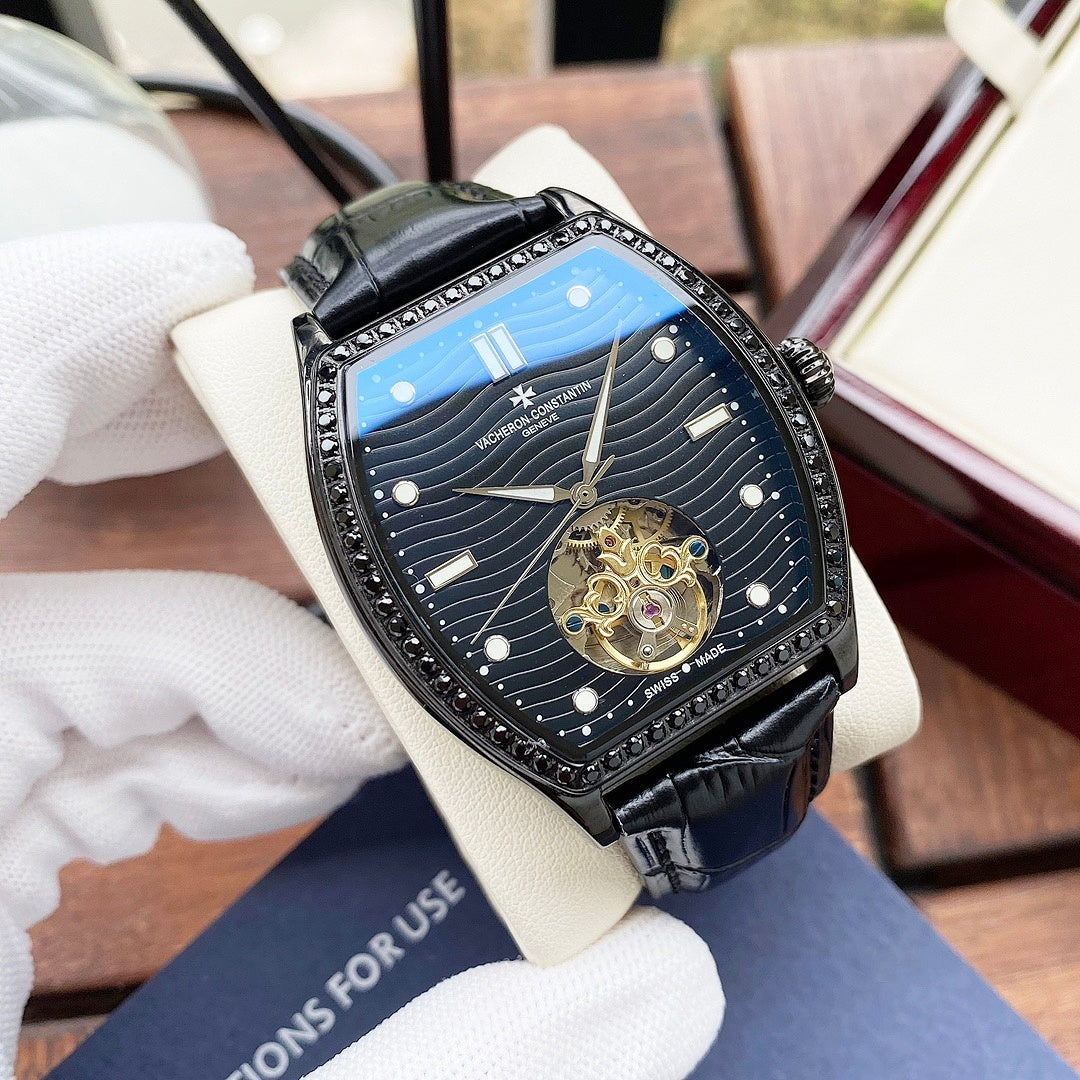 Wristwatch with blue dial, jeweled bezel, black leather strap