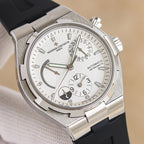 Vacheron Constantin watch with white dial, stainless steel case, black rubber strap