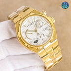 Gold automatic watch with white dial, black rubber strap, dial subdials visible