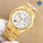 Gold watch with white dial and multiple subdials, black rubber strap shown