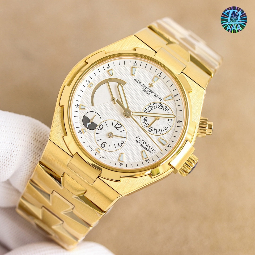 Gold watch with white dial and multiple subdials, black rubber strap shown