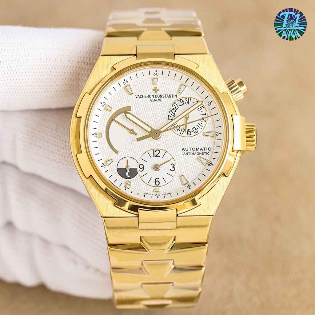 Gold automatic watch with white dial and black rubber strap, front view