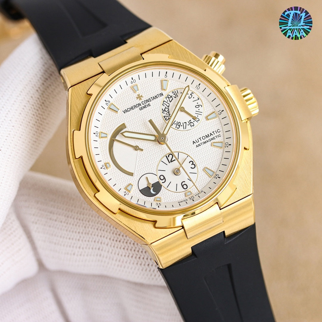 Gold watch with white dial and black strap, angled view of case and bezel