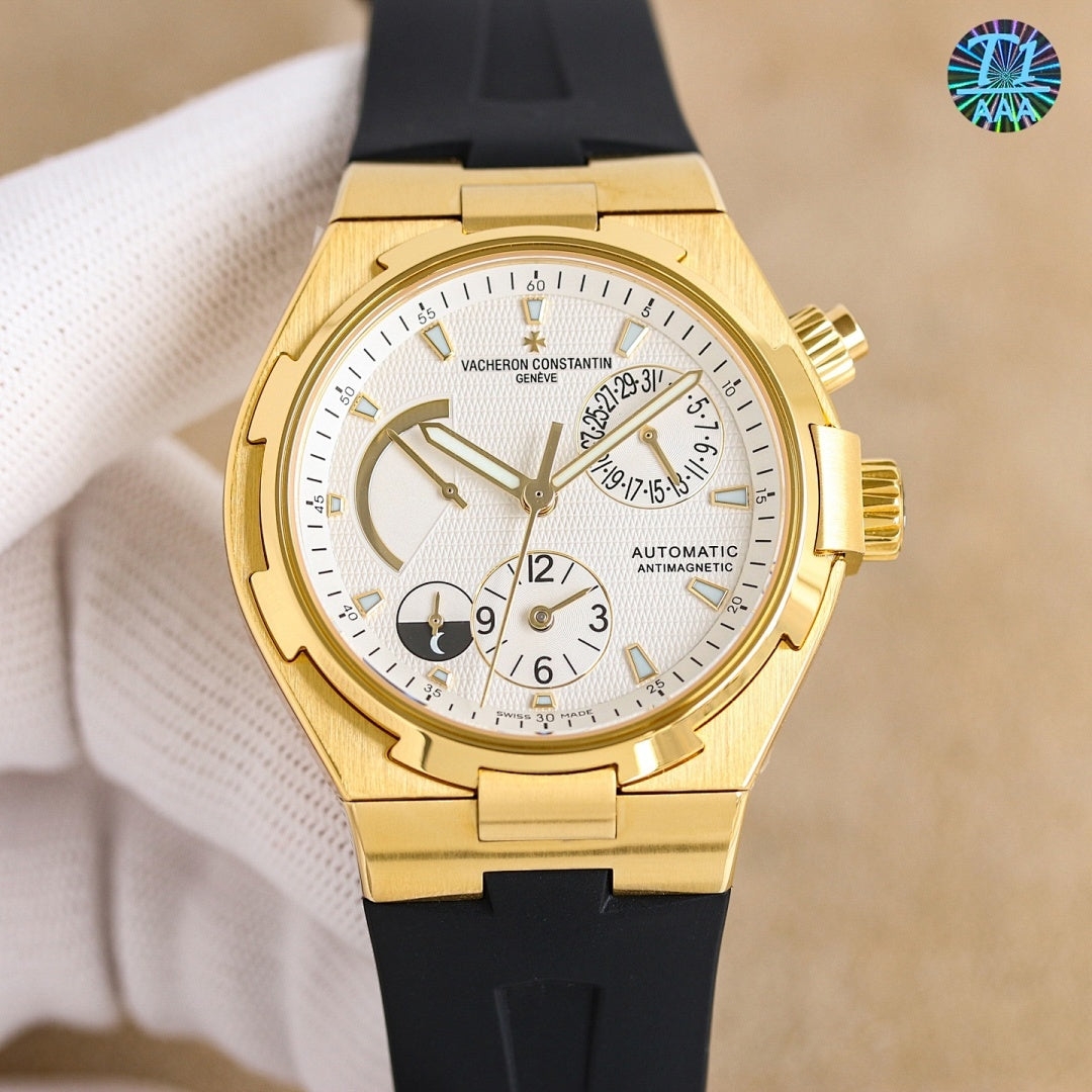 Gold Vacheron Constantin-style automatic watch with white dial and black rubber strap