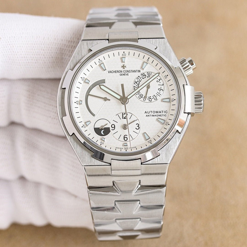 Vacheron Constantin automatic watch with white dial and steel bracelet, crown side view